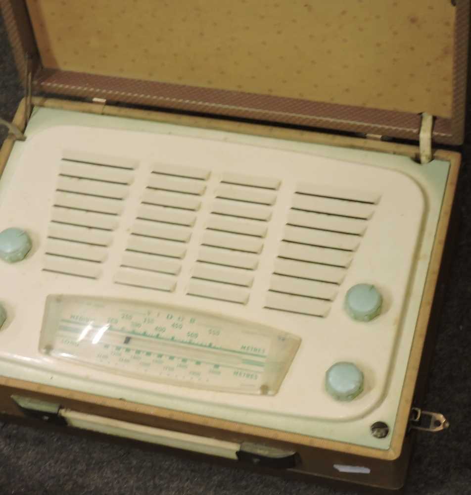 Lot 582 A violin, clock and radio