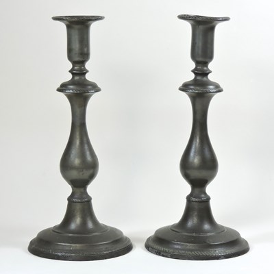 Lot 517 - A pair of Georgian pewter candlesticks