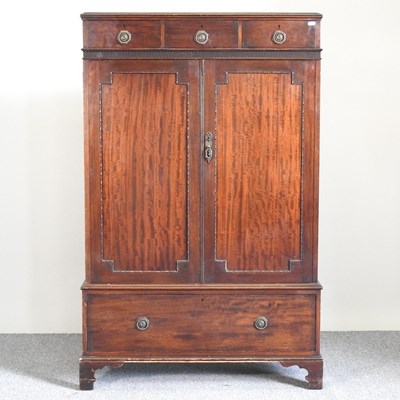 Lot 250 - A Waring and Gillows mahogany cabinet