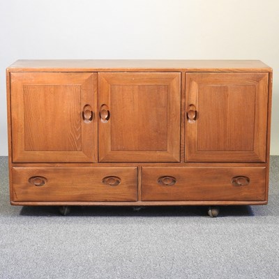 Lot 62 - An Ercol Windsor light elm sideboard