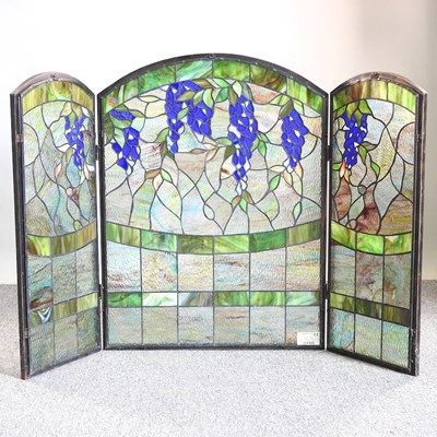 Lot 74 - A Tiffany style fire screen