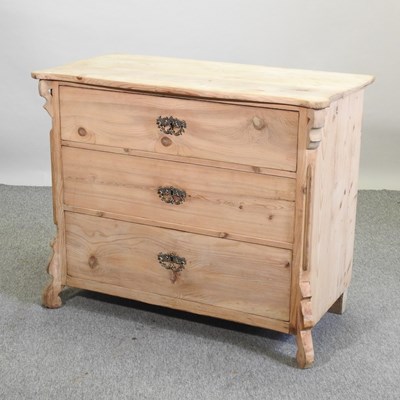 Lot 435 - A continental style pine serpentine chest