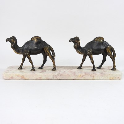 Lot 142 - An Art Deco bronzed model of two camels