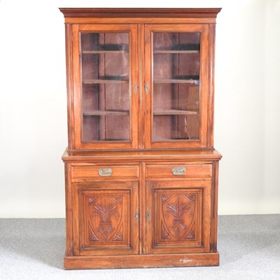 Lot 201 - A Victorian walnut cabinet bookcase