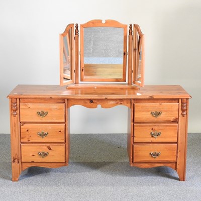 Lot 109 - A pine dressing table and mirror