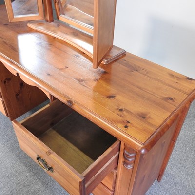 Lot 109 - A pine dressing table and mirror