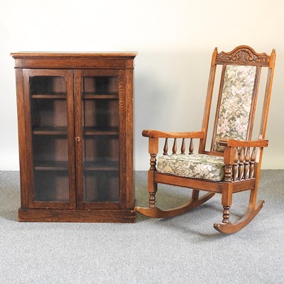 Lot 86 - A display cabinet and chair