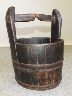 Lot 449 - A Chinese wooden bucket