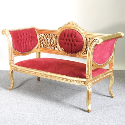 Lot 498 - A gilt framed sofa