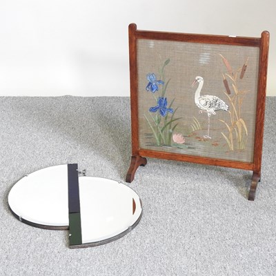 Lot 316 - A mirror and fire screen