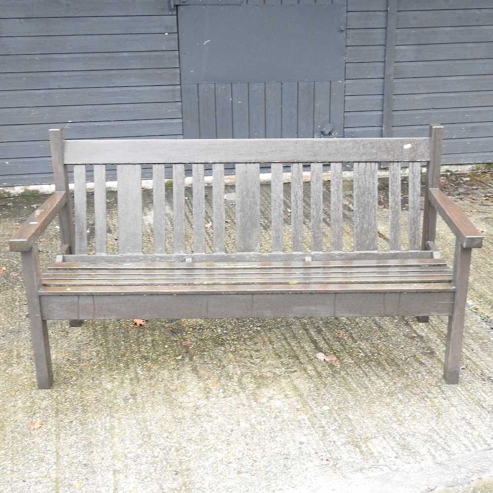Lot 20 - A teak garden bench