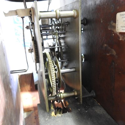 Lot 104 - An 18th century longcase clock