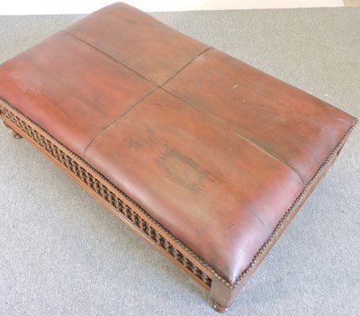 Lot 438 - A leather upholstered stool