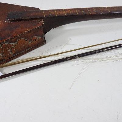 Lot 433 - A one string fiddle and bow