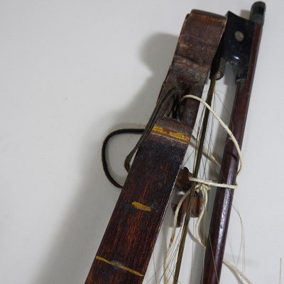 Lot 433 - A one string fiddle and bow