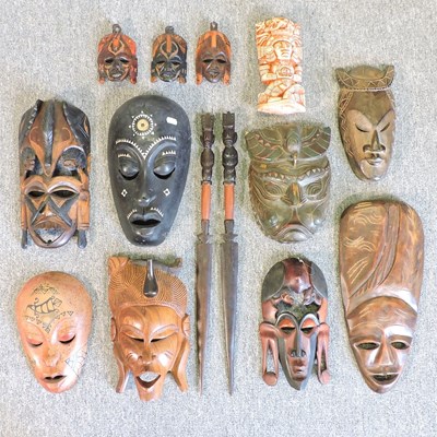 Lot 215 - A collection of carved wooden tribal masks