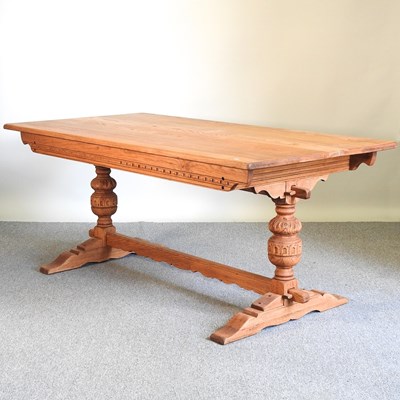 Lot 536 - A light oak refectory table