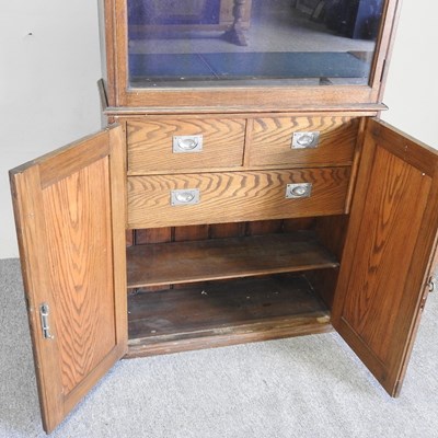 Lot 505 - An early 20th century gun cabinet