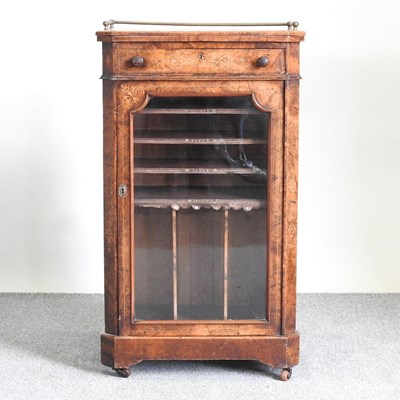 Lot 223 - A Victorian walnut music cabinet