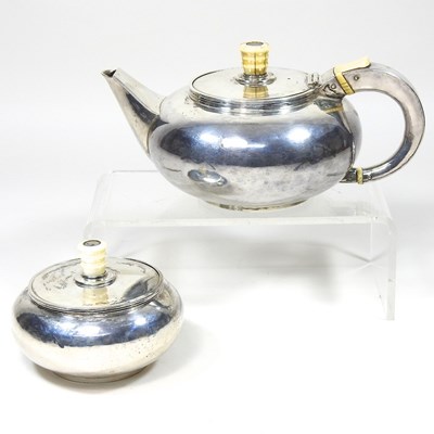 Lot 197 - A silver teapot and sugar bowl