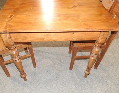 Lot 447 - A pine table containing a single drawer