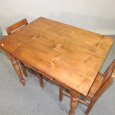 Lot 447 - A pine table containing a single drawer