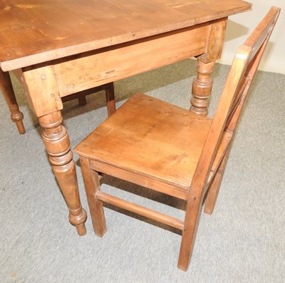 Lot 447 - A pine table containing a single drawer