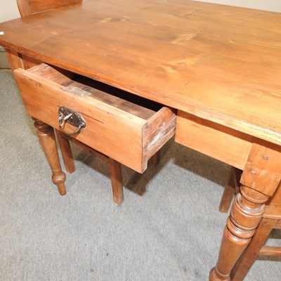 Lot 447 - A pine table containing a single drawer