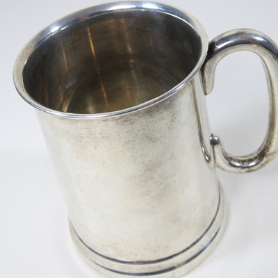 Lot 44 - An early 20th century silver pint mug