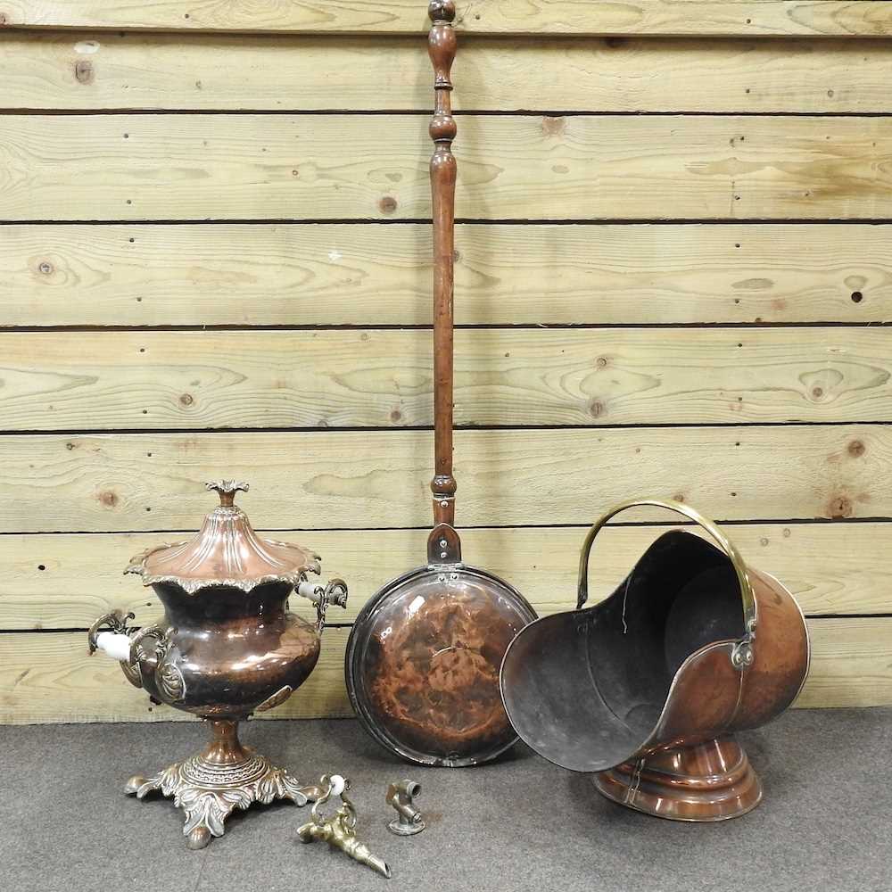 Lot 497 - A copper samovar, coal scuttle and warming