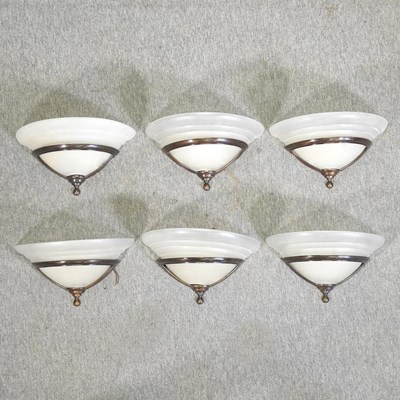 Lot 245 - A set of six Art Deco style metal wall lights