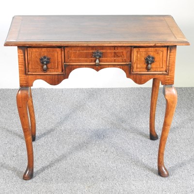 Lot 374 - An early 20th century lowboy
