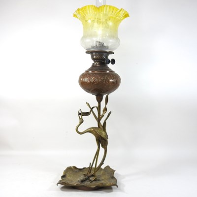 Lot 200 - An unusual Arts and Crafts copper and brass oil lamp