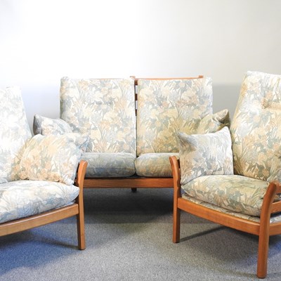 Lot 153 - An Ercol light elm three-piece suite