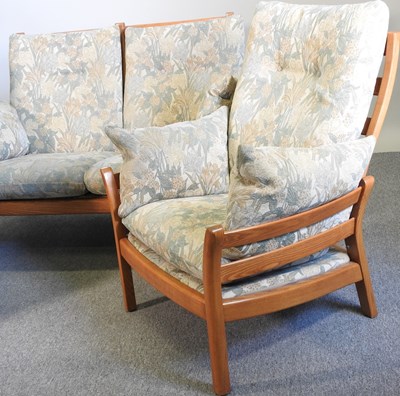 Lot 153 - An Ercol light elm three-piece suite