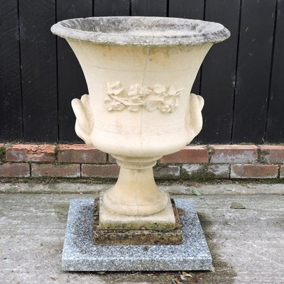 Lot 160 - A large cast stone garden urn