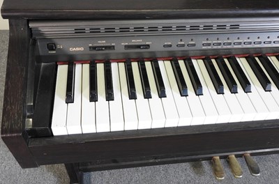 Lot 427 - A Casio electric piano