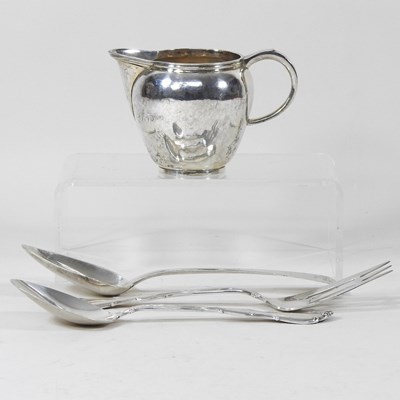 Lot 17 - A silver cream jug and cutlery