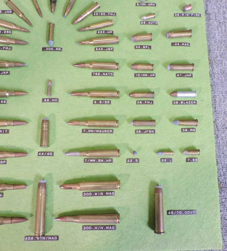 Lot 102 A gun cartridge display case