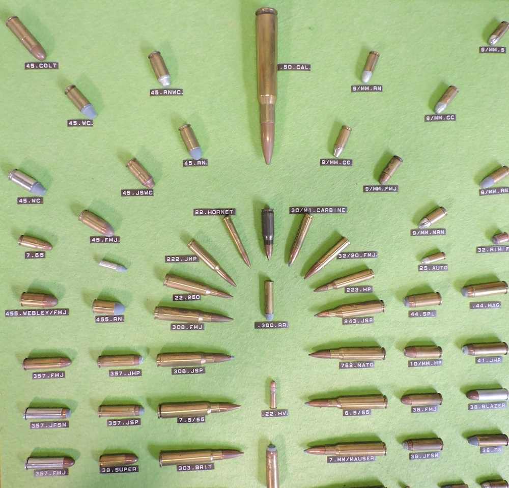 Lot 102 A gun cartridge display case