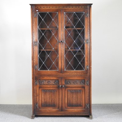 Lot 499 - An Old Charm glazed bookcase