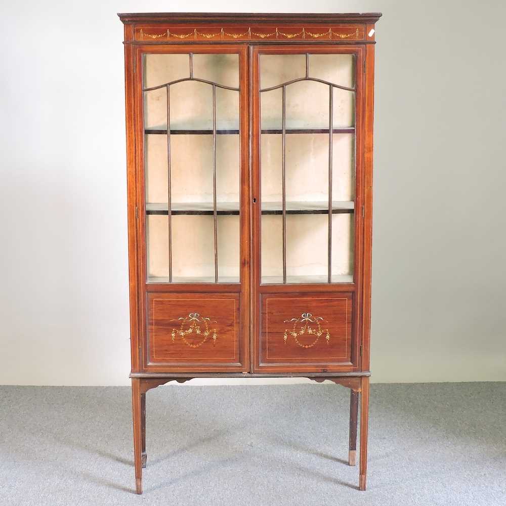 Lot 249 - An Edwardian display cabinet