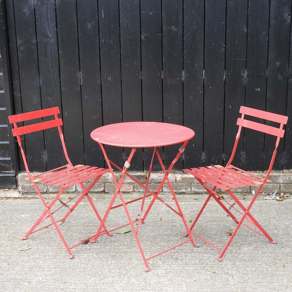 Lot 237 - A metal garden bistro set