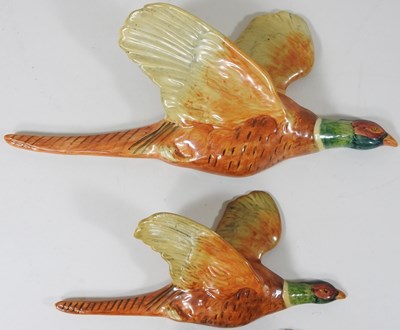 Lot 4 - A set of three Beswick pottery graduated wall mounted flying pheasants