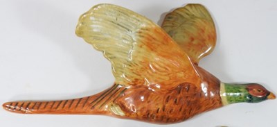 Lot 4 - A set of three Beswick pottery graduated wall mounted flying pheasants