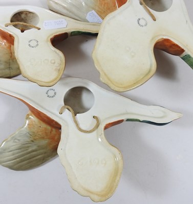 Lot 4 - A set of three Beswick pottery graduated wall mounted flying pheasants