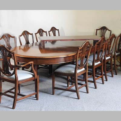 Lot 257 - A modern dining suite