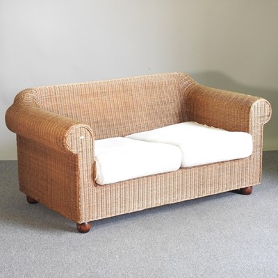 Lot 129 - A modern rattan conservatory sofa