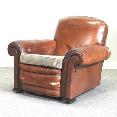 Lot 660 - A 1920's brown leather upholstered club armchair