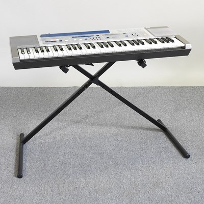 Lot 334 - A Korg electric organ